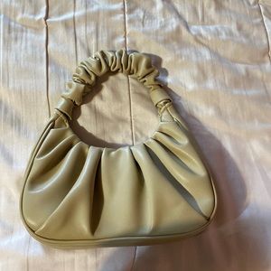 tan scrunched handle handbag